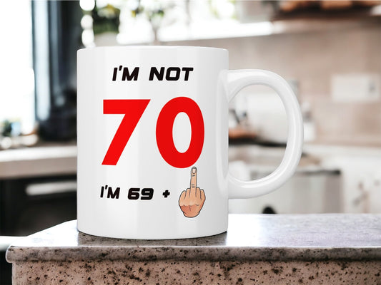 70th Birthday: I’m not 70 I’m 69+1 (middle finger) mug